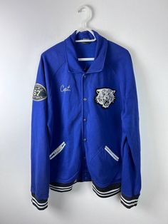 Unleash your inner beast with this Polo Ralph Lauren Capt Tiger Varsity Jacket! 🐯🧥 Perfect for any casual occasion, this blue cotton jacket is designed to make you stand out from the crowd. Available in size XXL for men. 

#PoloRalphLauren #VarsityJacket #MensFashion #CaptTiger #XXL #Blue #Cotton #Jacket  #eBay #eBayStore #eBaySeller #Jacket #Regular #VarsityJacket #Men #Blue #PoloRalphLauren #Cotton Collegiate Long Sleeve Streetwear Outerwear, Collegiate Long Sleeve Outerwear For Streetwear, Cotton Varsity Jacket With Baseball Collar For Outdoor, Casual Crew Neck Sports Outerwear, Sporty Long Sleeve Varsity Jacket With Pockets, Urban Long Sleeve Sport Coat For College, Casual Crew Neck Outerwear For Outdoor, Oversized Long Sleeve Windbreaker For College, Casual Long Sleeve Cotton Varsity Jacket