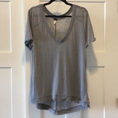 Nwot Free People V-Neck Tee; Hi/Low Front To Back Gray Relaxed Fit V-neck Top, Gray V-neck Top For Loungewear, Gray V-neck Loungewear Top, V-neck T-shirt For Layering In Spring, Short Sleeve V-neck Top For Spring Layering, V Neck Tee, Free People Tops, Free People, Womens Tops