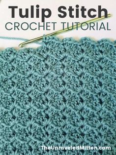 the tulip stitch crochet pattern is shown in blue yarn and has a knitting needle