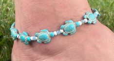 Sea Turtle Stretch Anklet, Turtle Bracelet, Womens Ankle Bracelet, turquoise colored beads, Ocean Beach jewelry, Turtle lover gift Bracelets are 7.5 inches long(fits most) Ankle bracelets come in sizes: Small-10 inches  Medium(fits most)-10.5 inches  Large-11 inches  If you need a specific length, please include a buyers note with your order so I can accommodate that request.  Made with clear, durable stretchy cord. Womens Ankle Bracelets, Tropical Jewelry, Turtle Bracelet, Ankle Bracelet, Turquoise Color, Ankle Bracelets, Ocean Beach, Beach Jewelry, Sea Turtle