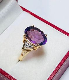 Beautiful Vintage 14k Yellow Gold Natural Amethyst Diamond Ring 100% Natural Amethyst Beautiful genuine Amethyst Amethyst 4.60CT Diamond(s) 0.06CT Color: G ]Clarity: SI1 Total ring weight: 4.6GR 14K Yellow Gold Ring sizing available Free of Charge For more information regarding this item feel free to reach me so I can accommodate your needs. Thank you Elegant Lavender Amethyst Ring In 14k Gold, Purple Diamond Ring In 14k Gold, Formal Amethyst Birthstone Ring With Gemstone Accents, Purple Ring With Gemstone Accents For Formal Occasions, Fine Jewelry Purple Rings With Diamond Accents, Fine Jewelry Purple Diamond Ring With Gemstone Accents, Purple Diamond Ring With Gemstone Accents, Purple Diamond Ring In Fine Jewelry Style, Amethyst Ring In Yellow Gold With Diamond Accents