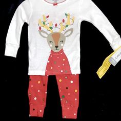 This 2 Piece Set Has A Cute Deer Tangled In Christmas Lights On The Front Of Shirt And Red Pants With Polka Dots Complete The Set. Playful Long Sleeve Holiday Sets, Playful White Sets For Festive Occasions, Playful Red Christmas Sets, Playful White Christmas Sets, Playful Red Festive Sets, Cute White Sets For Festive Occasions, Playful Red Festive Set, Playful White Holiday Sets, Cute Festive Winter Sets