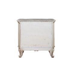 an old white cabinet with wheels on the front and bottom, against a white background