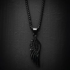 Our Black Wing Necklace features our Signature All Black Wing Pendant and a Black Box Chain. Some well-picked accessories can make all the difference when you are trying to upgrade your outfit, so don’t overlook The Black Wing Necklace which is built to last. Perfect when worn on it's on or with other pieces of black jewelry, level up any outfit today. - Size: One Size 56cm (23") Black Box Chain Necklace For Formal Occasions, Black Box Chain Necklace For Formal Events, Formal Black Box Chain Necklace, Black Pendant Chain Necklace Gift, Black Pendant Necklace For Formal Occasions, Black Metal Jewelry With Adjustable Chain, Black Metal Necklace With Chain, Black Metal Pendant Chain Necklace, Black Pendant Necklace With Chain