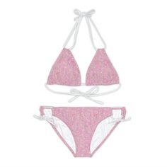 Adorable swimsuit with the rosy pink ditsy floral designed by Paula. Made with 4-way stretch Tricot (82% Microfiber, 18% Spandex), this strappy bikini set is the perfect companion to all swimming and beach adventures.  .: Material: 82% microfiber polyester, 18% spandex .: Medium fabric (7.5 oz /yd² (250 g/m .: Two piece swimsuit .: 7 strap colors to choose from .: Adjustable elastic straps .: Removable cups .: Assembled in the USA from globally sourced parts .: Seam thread color automatically matched to design (black or white) Designed and assembled in the USA Adjustable Swimwear For Spring, Pink Summer Swimwear With Adjustable Straps, Adjustable Pink Beachwear Swimwear, Pink Adjustable Beachwear Swimwear, Spring Strappy Stretch Swimwear, Pink Swimwear With Adjustable Straps For Pool, Pink Strappy Swimwear For Swimming, Strappy Swimwear For Spring Sunbathing, Pink Swimwear With Adjustable Straps For Summer