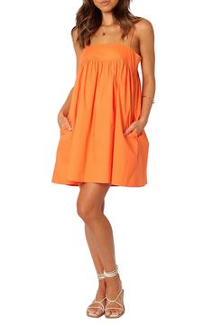 Cotton poplin in a summery shade adds sunshine-ready style to this shift dress popped with handy pockets at the sides. Slips on over head Square neck Adjustable straps Side-seam pockets Unlined 100% cotton Hand wash, line dry Imported Orange Gameday Outfit, Light Orange Dress, Orange Sun Dress, Auburn Gameday Outfit, Auburn Gameday, Cruise Fits, Orange Clothes, Orange Summer Dress, Created Colorful