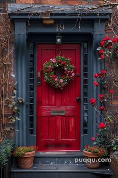 a red door with a wreath on it