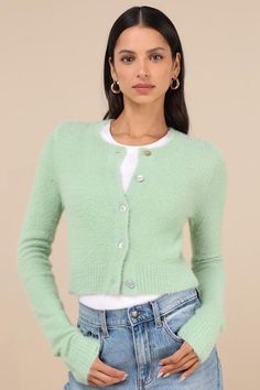 The Lulus Cozy Sweetness Mint Green Eyelash Knit Cropped Cardigan will be your favorite way to layer any look this season! Soft and fuzzy eyelash knit shapes this darling cardigan that features a classic crew neckline and long sleeves. The relaxed-fit bodice features a functional button placket along the center, before ending a trendy cropped hem. Contrasting ribbed knit accents the cuffs and hem. Fit: This garment fits true to size. Length: Size medium measures 17.75" from shoulder to hem. Bust Sage Green Cardigan, Mint Green Sweater, Mint Fashion, Fuzzy Cardigan, Cropped Cardigan, Sweater Blouse, Fitted Bodice, Button Placket, Custom Fit