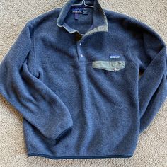 Vintage Patagonia In A Size Small. I’m Thinking It’s A Mens Small So Could Easily Fit A Ladies Medium. Good Used Condition. No Rips, Stains Or Anything Like That. The True Color Is More Charcoal Than The Blue. Olive Green Pocket And Trim Sweaters Vintage, Mens Sweaters, Vintage Patagonia, Patagonia Synchilla, Fits Clothes, Fit Inspo, Dream Clothes, Christmas List, Fitness Inspo