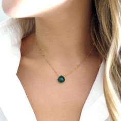 "This piece is SO beautiful! A faceted piece of green onyx is suspended from a 14k gold filled or sterling silver satellite chain. Dainty and feminine. Love it! Shop Landon Lacey Jewelry » www.etsy.com/shop/landonlacey it's in the DETAILS . . . » 14k gold filled or sterling silver satellite chain » Emerald green onyx - milky and beautiful » The model is petite and is wearing this necklace at 15\"; this could fit shorter or longer depending on body type. Please measure! it's in the OPTIONS . . . Emerald Briolette Necklace As A Gift, Emerald Briolette Necklace For Gift, Jade Birthstone Necklace For May, May Jade Birthstone Necklace, Minimalist Green Faceted Jewelry, Faceted Pendant Necklace For May Birthstone, Faceted Green Onyx Jewelry For Gift, Green Onyx Faceted Jewelry Gift, Green Onyx Gemstone Round Necklace