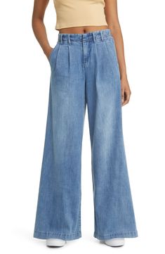 Make a statement in these pleated, vintage-inspired jeans fashioned with trouser-style pockets and superwide legs that sway with every step. 32" inseam; 30" leg opening; 11 1/2" front rise; 15 1/2" back rise Zip fly with button closure Side slant pockets 63% cotton, 27% polyester, 8% rayon, 2% spandex Machine wash, tumble dry Imported Super Wide Leg Jeans, Trouser Style, Wide Leg Jeans, Jeans Style, Leg Jeans, Vintage Inspired, High Waist, Wide Leg, Trousers