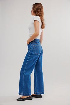 High-waisted jeans featured in a wide-leg silhouette. * Authentic denim * Front and back patch pockets * Button closure and zip fly | Rolla’s Sailor Jeans by Rolla's at Free People in Medium Wash, Size: 32 Sailor Jeans, Sailor Jean, Blue Fits, Back Patch, Boho Clothing, Jeans Dress, Jeans Shop, Boho Outfits, High Waist Jeans