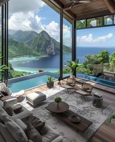 a living room filled with furniture next to a large window overlooking the ocean and mountains