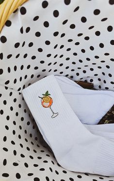 High quality embroidered socks! Composition: 85% combed cotton, 10% polyamide fiber, 5% elastane. These socks are made from combed cotton for a comfortable and non-shrinking fit. Step up your sock game with these fun Aperol Spritz Embroidered Socks! These stylish white socks feature a detailed embroidered design of the iconic Aperol Spritz cocktail, perfect for adding a playful touch to your wardrobe. Whether you're gifting a cocktail lover or treating yourself, these cozy socks blend comfort an Fun Cotton Socks For Gifts, White Cotton Socks For Gifts, White Cotton Socks As A Gift, White Cotton Socks As Gift, Summer Cotton Socks For Gifts, Fun White Socks As A Gift, Fun White Socks As Gift, Embroided Socks, Embroidery Socks