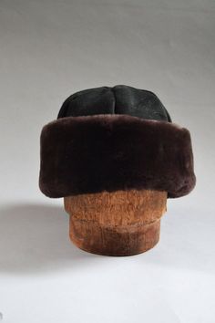 The Classic - Black with Brown Mouton Brim - Shearling Hat Sheepskin Fur Winter Black Sheepskin Hats, Brown Leather Hats With Faux Fur Lining, Black Hat With Faux Fur Lining, Classic Leather Hat For Winter, Classic Leather Winter Hat, Vintage Leather Hats For Winter, Vintage Leather Winter Hats, Brown Sheepskin Hat With Faux Fur Lining, Vintage Fur Felt Hat For Winter