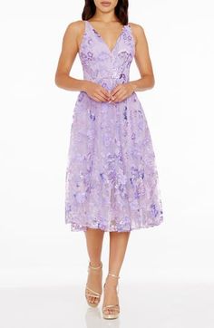 A lavish garden scene is embroidered all over this figure-flaunting dress topped with a slim, plunging bodice and finished with a breezy, flared skirt. 44 1/2" length (size Small) V-neck Sleeveless Partially lined 100% polyester Hand wash, dry flat Imported Cocktail Dress Nordstrom, Audrey Dress, Shop Dress, Dresses Xxl, Dress The Population, Flared Skirt, Plunging Neckline, Nordstrom Dresses, Purple Dress