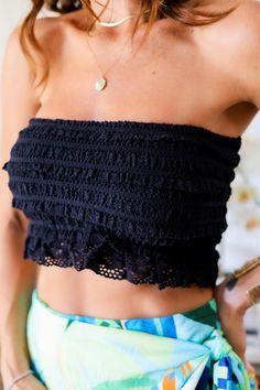 Turn up the heat with the Avery tube top! This spicy top will add some sizzle to your wardrobe. Get ready to stand out and spice things up with this fun and flirty tube top. Perfect for a night out or a day at the beach. (Caution: may cause heatwaves and turning heads!) Color: Black Strapless Tube Top Ruffle Detail Lace Hem Trim Half Smocked Back Slight Stretch No zipper closure True to size Model is wearing a size Small. She is 5'6". 130lbs. Bust: 34" Waist 26" Hips 36" Bottom Workout, Head Color, Lace Hem, Day At The Beach, Dressy Tops, Swimwear Sale, Turn Up, Outerwear Sweater, Dressy Casual