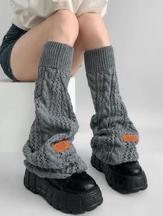 Elevate your winter wardrobe with our Gray/Black/Milk White Knit Flared Leg Warmers. Crafted from high-quality, soft knit fabric, these leg warmers are designed to provide both warmth and style. The flared design adds a touch of elegance and a retro flair, making them a perfect accessory for any outfit. Available in versatile colors of gray, black, and milk white, these leg warmers can easily be paired with skirts, dresses, or even over jeans for a chic layered look. Garment Size SizeFree SizeFull Length52Cuff16/44 Black Cotton Leg Warmers For Fall, Trendy Black Cotton Leg Warmers, Warm Stretch Winter Sweater, Black Cotton Casual Leg Warmers, Casual Black Cotton Leg Warmers, Solid Cotton Leg Warmers For Fall, Cotton Knee-high Leg Warmers For Fall, Winter Cotton Black Leg Warmers, Black Cotton Leg Warmers For Winter