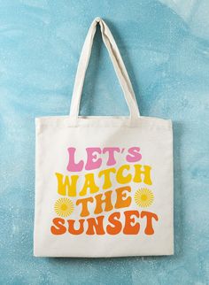 "Groovy \"Let's Watch the Sunset\" tote bag Totes for School, beach or shopping. Also great for day care and the library!  These handmade, reusable 15\" x 16\" canvas totes are carefully hand-made by me just for you. These bags are super durable and big enough to carry a lunch box, towel or other belongings. Great for the beach! This multipurpose canvas tote bags comes in multiple color options and is ideal for school or office work, grocery shopping, a park of beach visit and other daily activi Summer Shoulder Bag With Letter Print, Trendy Canvas Bag With Adjustable Strap For Vacation, Beach Season Vacation Canvas Bag With Adjustable Strap, Beach Season Canvas Bag With Adjustable Strap, Summer Canvas Bag With Adjustable Strap, Summer Canvas Shoulder Bag With Letter Print, Canvas Beach Bag With Adjustable Strap, Trendy Canvas Shoulder Bag For Beach Season, Summer Canvas Shoulder Bag For Vacation