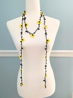 Flower Wrap Necklace / Flower Lariat Necklace / Crochet Lariat | Etsy Adjustable Yellow Lariat Necklace, Black Crochet Bohemian Jewelry, Black Bohemian Crochet Jewelry, Yellow Flower Necklace For The Beach, Yellow Flower Necklace For Beach, Yellow Necklace For Spring Beach Occasion, Black Bohemian Flower Necklace, Bohemian Black Flower Necklace, Yellow Crochet Bohemian Jewelry