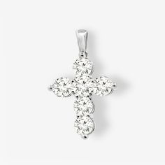 This generously sized cross pendant features 1.85 carats of natural diamonds, cut to the highest standards and set in brilliant white gold to make the diamonds shine their brightest. Let your faith be seen with this stunning heirloom quality piece. Pair this with any of the devotional pieces in our Religious Collection. Natural Diamonds: 1.85ctw 14K White Gold Length: 1 Inch (Chain not included) Luxury Diamond White Brilliant Cut Cross Necklace, Luxury White Diamond Accents Cross Necklace, Luxury Diamond Cross Necklace For Anniversary, Luxury Classic Diamond White Cross Necklace, Luxury Silver Cross Diamond Necklace, Luxury Diamond White Cross Pendant, Luxury White Gold Cross Necklace For Anniversary, Luxury Sterling Silver Cross Diamond Necklace, Luxury Diamond White Cross Necklace For Formal Occasions