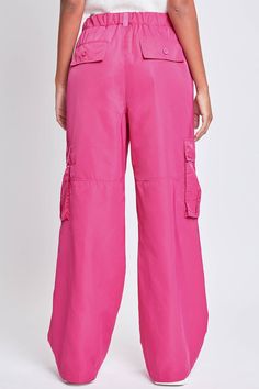 Every day is a new chance to wear our Relaxed Fit Cargo Pants. This high-waisted nylon pant features a relaxed fit for both style and comfort, ensuring you'll look good and feel good throughout the day. Includes classic front pockets, three cargo pockets with button closures, and faux back pockets. Casual Pink Nylon Pants, Spring Utility Full Length Parachute Pants, Pink Nylon Casual Parachute Pants, Spring Nylon Pink Pants, Pink Utility Wide Leg Parachute Pants, Pink Wide Leg Utility Parachute Pants, Pink Relaxed Fit Wide Leg Parachute Pants, Pink Wide-leg Parachute Pants With Cargo Pockets, Pink Wide Leg Parachute Pants With Relaxed Fit