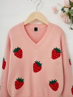 Add a dash of playful appeal to your casual wear with our Plus Size Strawberry Pattern Pullover Sweater. This sweater features a fresh fruit and vegetable pattern, with vibrant strawberry embroidery that pops against the soft pink backdrop. The V-neck design flatters the neckline, while the long sleeves and drop-shoulder cut offer a comfortable, relaxed fit. Designed with a loose outline, this pullover ensures a breezy feel with plenty of room to move. The knitwear fabric provides a slight stret Cute V-neck Fall Sweater, Trendy Cotton V-neck Sweater For Spring, Trendy Cotton Long Sleeve V-neck Sweater, Trendy Long Sleeve Cotton V-neck Sweater, Cute V-neck Sweater For Spring, Cute V-neck Top For Fall, Casual Pink Knit V-neck Sweater, Trendy Pink V-neck Sweater, Cute V-neck Knit Sweater