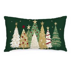 a green christmas pillow with gold glitter trees and stars on the front, along with a red ribbon