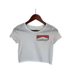 This faded distressed Cowboys crop top is perfect to dress up or wear casual. The image is sublimated onto the material making the top buttery soft! **This crop top is fitted and runs slightly on the smaller side.** Fabrication: 52% Airlume combed and ring-spun cotton 48% poly Cowboys Vintage Distressed Crop Top, Crop Tops Women, Vintage Crop Top, 90s Crop Top, Country Concert Gifts, Concert Gifts, Short Sleeve Crop Top, Lightweight Crop Top, Crop Top for Women, Boho Hippie Clothing, 90s Fashion Grunge Cropped T-shirt For Summer, Summer Band Merch Cropped T-shirt With Graphic Print, Summer Band Merch Cropped T-shirt With Crew Neck, Band Merch Cropped T-shirt For Summer, Summer Band Merch Cropped T-shirt With Short Sleeves, Summer Band Merch Cropped T-shirt, Casual Crop Top With Graphic Print For Concerts, Summer Distressed Cropped Top, Casual Crop Top For Music Festival