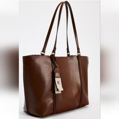 New With Tag Zara 2024 Collection Tote Bag. Shoulder Strap. Pendant Detail. Interior Maxi Pocket. Magnetic Closure. Height Length Width: 11.6 14.4 4.7 Inches(29.5 36.5 12 Cm) Brown | 6071/410 Outer Shell 100% Polyurethane Lining 65% Polyester 35% Cotton Zara Tote Bag, Zara Tote Bags, Xmas Wishlist, Zara Bags, 2024 Collection, Bag Shoulder, Magnetic Closure, Shoulder Strap, Bag Lady