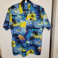 PALMWAVE HAWAII HAWAIIAN 2XL MEN'S SHORT SLEEVE SHIRT BLUE/PALM TREE PRINT IMPORTANT BEFORE YOU BUY ITEM PLEASE READ DESCRIPTION AND CONDITION CAREFULLY! Measurements: Please see above photos for measurement Template. It is recommended to compare these measurements with a similar garment that you own. A) SHOULDER............19  " B) CHEST.....................25  " C) LENGTH..................30  " D) SLEEVE LENGTH.... SHORT SLEEVE " THIS ITEM WAS CHECKED FOR CONDITION OF ITEM. EACH FLAW THAT WE F Blue Short Sleeve Shirt With Camp Collar For Beach, Blue Short Sleeve Camp Shirt For Summer, Blue Hawaiian Camp Shirt For Beach, Blue Hawaiian Shirt With Hibiscus Print For Beach, Blue Hawaiian Shirt With Hibiscus Print For Summer, Blue Hawaiian Shirt For Beach, Blue Hibiscus Print Shirt For Beach, Blue Short Sleeve Shirt With Floral Print For Vacation, Blue Floral Print Short Sleeve Shirt For Vacation