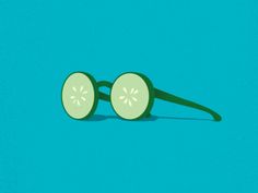 two slices of cucumber on a blue background