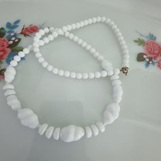 Vintage White Milk Glass Collar Necklace c1950's A striking and stunning milk glass beaded collar necklace  In a very good vintage condition this piece has been truly well looked after. Looks amazing on.  Box for display only but it will come beautifully gifted to you.   OVERSEAS WELCOME Handmade Vintage White Necklace, Vintage White Necklaces With Large Beads, Vintage White Round Beaded Necklaces, Vintage White Single Strand Necklace, Vintage White Single Strand Beaded Necklaces, Vintage White Single Strand Beaded Necklace, Vintage White Beaded Necklace With Large Beads, Vintage White Handmade Beaded Necklaces, Vintage White Handmade Beaded Necklace