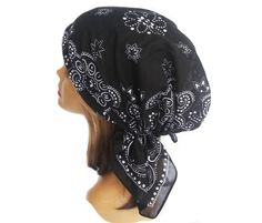 Comfortable lightweight non-stretch pre tied bandana / head scarf / Tichel Elastic back for easy-on, easy-off style. Perfect to wear for those with hair loss or as a fun fashion statement. Women's one size fits most. Machine Wash Cold. Made in the USA. 100% Cotton Lawn Black One Size Headwrap For Summer, Trendy Black Headwrap For The Beach, Trendy Black Headwrap For Beach, Adjustable Black Headwrap For The Beach, Adjustable Black Headwrap For Beach, Adjustable Black Bandana For Spring, Black Beach Headscarf One Size, Adjustable Black Casual Headwrap, Black Headscarf For Beach