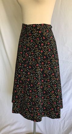 "Beautiful 1970's era Italian brand Ennebi Firenze, cotton velveteen, A-line skirt in a great floral print!! Skirt zips up the side with a metal zipper and the snaps and hooks at the waistband. Skirt is fully lined with a lightweight black poly lining. Excellent condition- there is some tiny (1/16\") red looking paint spots on the mid front, which cannot really be seen due to the print, but I felt I should mention. Label: Ennebi Firenze- 44- (there's some more wording in Italian, looks like fact Cotton A-line Skirt With Floral Print, Vintage Floral Print Skirt For Fall, Retro Flared Skirt With Floral Print, Retro Floral Print Cotton Skirt, Vintage Cotton Floral Print Skirt, Vintage Cotton Skirt With Floral Print, Collared Shirt Dress, Sailor Collar, Bishop Sleeve