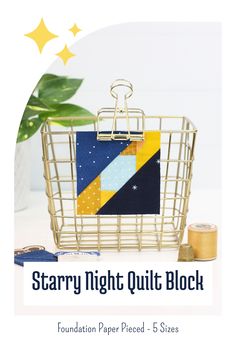 the starry night quilt block is shown in front of a basket with scissors and thread