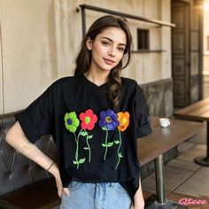 Qteee - Premium 3D Blossom Embroidered Relaxed-Fit T-Shirt Casual Black Shirt With Floral Embroidery, Trendy Embroidered Short Sleeve Tops, Spring Crew Neck Tops With Floral Embroidery, Short Sleeve Shirt With Embroidered Graphics For Spring, Spring Short Sleeve Shirt With Embroidered Graphics, Black Floral Embroidery Crew Neck T-shirt, Embroidered Black T-shirt For Spring, Casual Embroidered Graphics T-shirt For Spring, Black Embroidered T-shirt For Spring