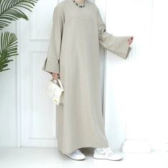 Casual Fall Abaya, Casual Long Abaya For Fall, Casual Long Fall Abaya, Casual Solid Color Abaya For Spring, Casual Abaya For Spring, Casual Solid Abaya For Spring, Casual Winter Abaya, Spring Casual Maxi Length Abaya, Casual Spring Abaya