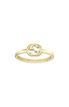 The recognizable GG-logo centers this 18-karat-gold ring that's perfect for stacking. 1/4" pendent; 1/8" band 18k gold Made in Italy