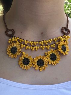 Handmade Bohemian Sunflower Necklace, Turkish Needle Lace Jewelry, Mom Gifts, Traditional Oya ❤️ Beaded Sunflower Necklace is special for women. You can wear this handmade necklace every day. The sunflower necklace will definitely add a stylish finishing touch to your look. You can choose this handmade necklace as a birthday gift or anniversary gift for your mother, wife or girlfriend. If they like beaded jewelry and needlework, this unique handmade necklace is a perfect choice for them. 🎁 Uniq Bohemian Brown Flower Necklace, Bohemian Flower Necklace For Summer, Bohemian Sunflower Design Jewelry For Summer, Yellow Bohemian Jewelry With Sunflower Design, Bohemian Yellow Jewelry With Sunflower Design, Bohemian Summer Jewelry With Sunflower Design, Bohemian Sunflower Design Summer Jewelry, Bohemian Yellow Sunflower Design Jewelry, Bohemian Gold Flower Necklace