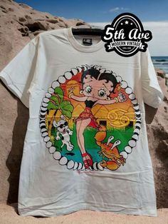 Betty Boop Beach single stitch t shirt - Vintage Band Shirts Vintage Summer Tops With Character Print, Vintage Character Print Tops For Summer, Vintage Cotton T-shirt With Character Print, Vintage White T-shirt With Character Print, Vintage Cotton T-shirt With Cartoon Print, Vintage White T-shirt With Cartoon Print, White Vintage T-shirt With Cartoon Print, Retro Cotton T-shirt With Cartoon Print, Vintage Tops With Character Print And Relaxed Fit