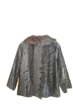 "Luxurious vintage 60s black plush cropped jacket. Box style. Accented with a shawl style , dark brown rabbit fur. Double breasted. Raglan sleeve. Not a full length. Closure up front with a textured black Lucite, large buttons. Two sides hiding pockets. Lined with a black polyester. Rich, classy, elegant. Excellent condition. Look like new. Very clean inside and out. No any damage. No odor. You can use as a gift. Length :24,0\" Sleeve with a shoulder line: 24,0\" Bust:42,0\" Width of the sleeve: Vintage Formal Fur Coat With Faux Fur Trim, Vintage Black Fur Coat For Fall, Black Vintage Fur Coat For Fall, Vintage Black Fur Coat With Faux Fur Lining, Brown Rabbit, Shawl Style, Style Dark, Large Buttons, Cropped Jacket