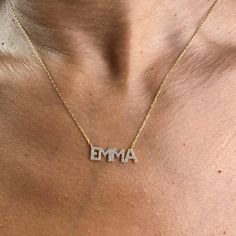 "This 14k personalized diamond name necklace is the perfect gift for the bridal party, someone special, or yourself. * All letters are capital. M A T E R I A L & L E N G T H Available in 14k Yellow Gold, 14k Rose Gold, 14k White Gold, Sterling Silver Thickness: 1.2mm / 0.05\" Initials: 6 mm Diamond: 0.15 ct. - 0.40 ct. depending on the name Color: G Quality: SI-VS Additional Notes: * Non-Conflict Diamonds * Made in the USA C U R R E N T ∙ T U R N A R O U N D Processing Time:1-2 weeks Within Diamond Necklace For Mother's Day Personalized Gift, Personalized Cubic Zirconia Necklace For Special Gifts, Personalized Cubic Zirconia Necklaces, Personalized Diamond Necklace For Birthday, Gift Diamond Accents Initial Pendant Name Necklace, Anniversary Cubic Zirconia Name Necklace, Custom Name Initial Pendant Necklace For Anniversary, Anniversary Name Necklace With Diamond Accents In Cubic Zirconia, Personalized Diamond Name Necklace In White Gold