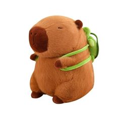 a stuffed animal with a green ribbon around its neck