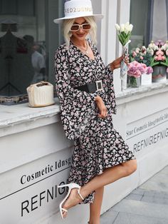 Black Black Floral Print Spring Dress, Black Floral Print Dress For Spring, Black Floral Dress For Spring, Spring Black Floral Dress, Black Floral Midi Dress For Spring, Feminine Long Sleeve Black Dress, Chic Long Sleeve Floral Dress For Spring, Black Floral Print Dress For Fall, Long Sleeve Floral Beach Dress For Fall