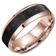 a rose gold wedding band with black inlay