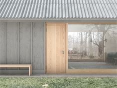 a wooden bench sitting in front of a window on top of a grass covered field