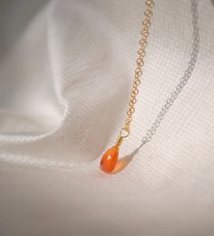 Harness the potent energy of Carnelian! Carnelian is the orange variety of Quartz that's known for its ability to stoke creativity, foster positivity, and stimulate passion. This isn't just a necklace – it’s a tool for transformation.We hand select each triangular-shaped gem when crafting your one-of-a-kind necklace. Carnelian naturally ranges in color from orange to red and can be either solid in color, or with colorful bands running through it. If you have a preference for a stone type please Necklace C, Carnelian Necklace, Teardrop Necklace, Teardrop Pendant, 14kt Gold, Are You The One, Gold Filled, The Fosters, Gems