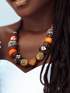 Unique Orange Necklace With Polished Beads, Unique Orange Necklace With Wooden Beads, Unique Orange Necklace With Large Beads, Unique Orange Jewelry With Wooden Beads, Orange Wooden Beads For Jewelry Making, Unique Long Beaded Necklace, Unique Orange Beaded Necklaces, Elegant Multicolor Wooden Beads Necklaces, Unique Orange Round Bead Necklaces