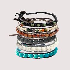 These men's bracelets by Lotus and Luna are wonderfully handcrafted by local female artisans in Thailand. They are made with semi-precious stones, 100% cotton cords and coconut shell clasps. Some of the stones used include Jade, Lava Stone, Turquoise and Hematite. The cords are fully adjustable to four different size options, so that you may get the perfect fit. Length ranges from 7.85 in at the first closure to 10.25 in at the last closure, so it will fit most wrists. Simply adjust to your perf Adjustable Hippie Bracelets With Natural Stones, Adjustable Artisan Hand Wrapped Bracelets, Hippie Adjustable Bracelets With Natural Stones, Adjustable Spiritual Leather Bracelet With Natural Stones, Adjustable Natural Stone Wrap Bracelet For Festivals, Adjustable Fair Trade Beaded Bracelets For Friendship, Adjustable Artisan Beaded Bracelets For Everyday, Bohemian Hand-strung Bracelets With Waxed Cord, Adjustable Hand Wrapped Spiritual Leather Bracelet